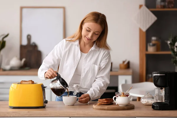 Mature Woman Making Tasty Toasts Drinking Coffee Kitchen — 스톡 사진