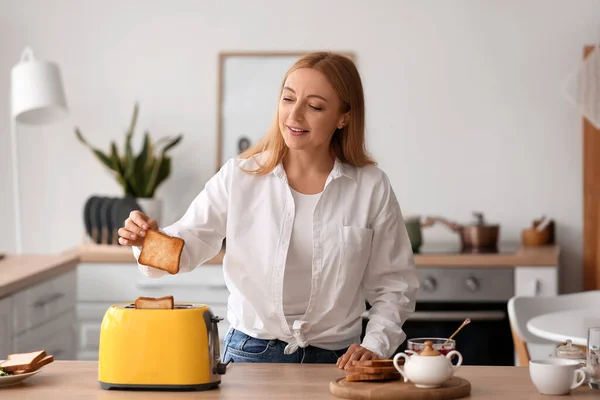 Mature Woman Making Tasty Toasts Kitchen — Stock Photo, Image