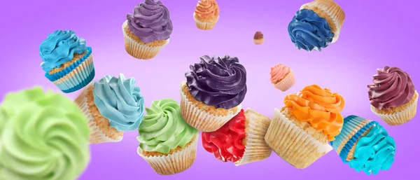 Many Flying Birthday Cupcakes Violet Background — Fotografie, imagine de stoc