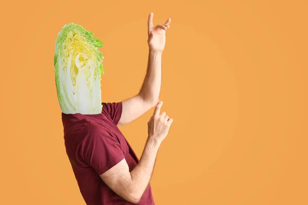 Dancing Man Cut Chinese Cabbages Instead His Head Orange Background — стоковое фото
