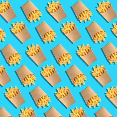 Many paper bags with tasty french fries on blue background. Pattern for design