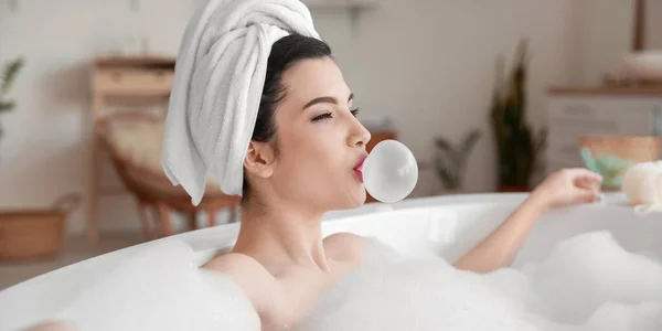 Relaxed Young Woman Chewing Gum Taking Bath Home — Stock Fotó