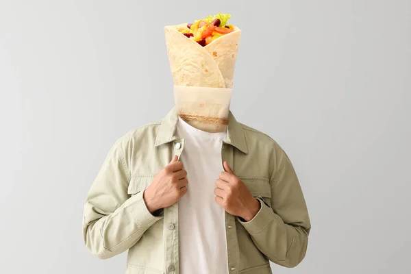 Young Man Tasty Burrito Instead His Head Light Background — Fotografia de Stock