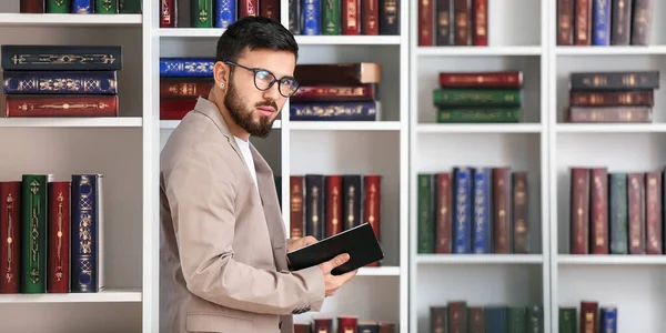 Handsome Student Choosing Book Library — Stock Photo, Image