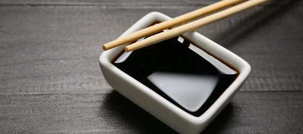 Bowl Soy Sauce Chopsticks Dark Wooden Background Closeup — Stock Photo, Image