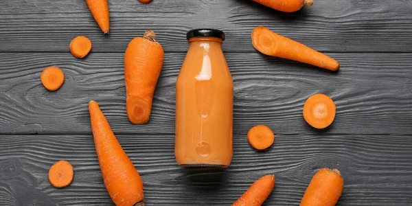 Bottle Healthy Carrot Smoothie Dark Wooden Background Top View — Stock Photo, Image