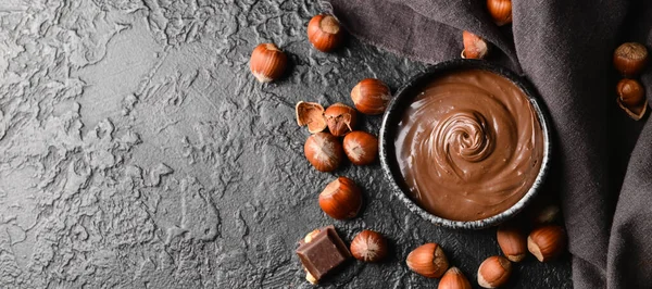 Bowl Tasty Chocolate Paste Hazelnuts Dark Background Space Text — Stock Photo, Image