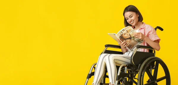 Young Woman Wheelchair Reading Magazine Yellow Background Space Text — Foto Stock