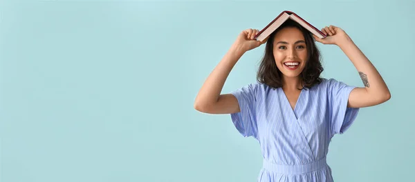 Beautiful Funny Young Woman Holding Book Light Blue Background Space — Photo