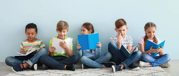 Cute Little Children Reading Books Light Blue Background — Photo