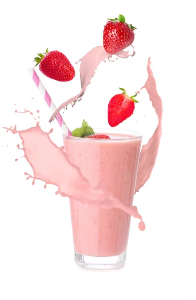 Glass Tasty Strawberry Milkshake Splashes White Background — Stockfoto