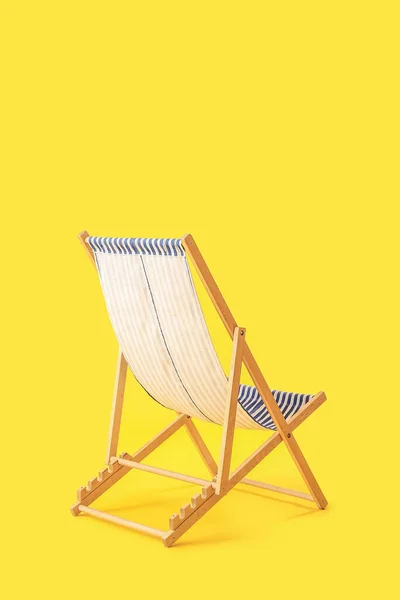 Wooden Deck Chair Yellow Background — 스톡 사진
