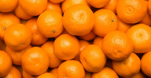 Many Sweet Tangerines Background Top View — стоковое фото