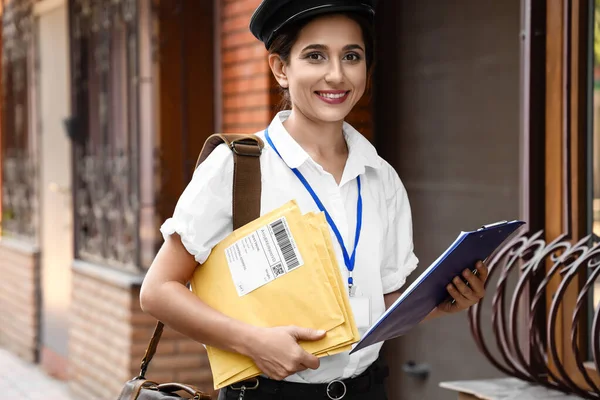 Young Postwoman Letters Clipboard Outdoors — Stock Photo, Image