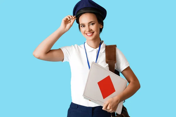 Young Postwoman Envelopes Blue Background — Fotografia de Stock