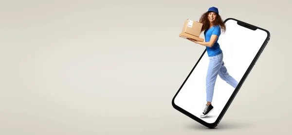Female African American Courier Parcels Jumping Out Smartphone Screen Light — Φωτογραφία Αρχείου