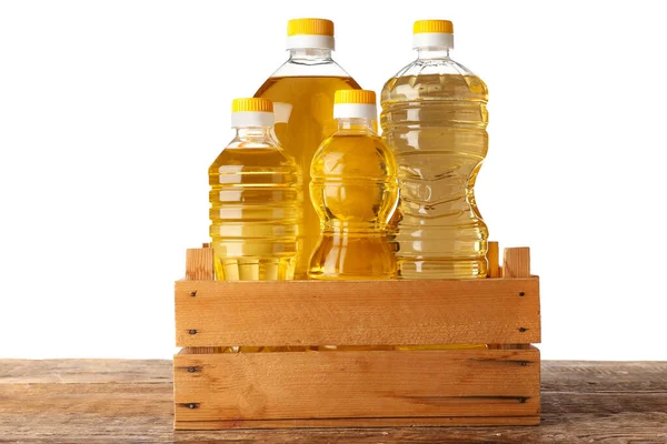 Bottles Sunflower Oil Crate Wooden Table White Background — Stock Photo, Image