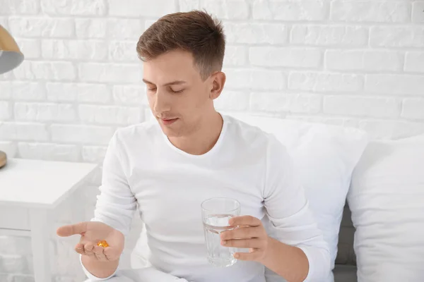 Young Man Vitamin Supplement Glass Water Bedroom — Stock Photo, Image