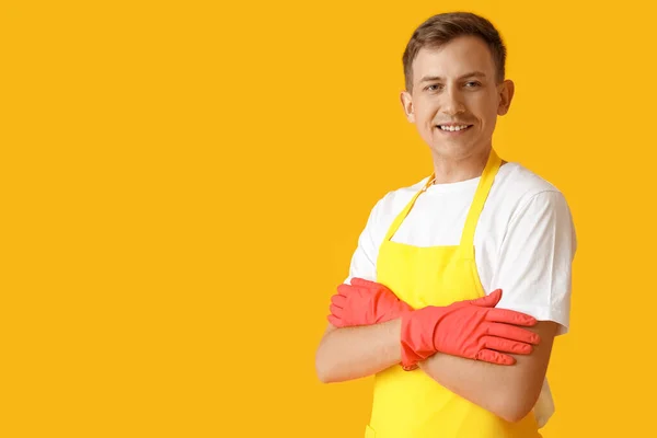 Young Man Apron Rubber Gloves Yellow Background —  Fotos de Stock