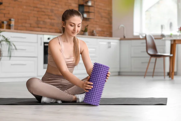 Young Woman Foam Roller Kitchen — 图库照片