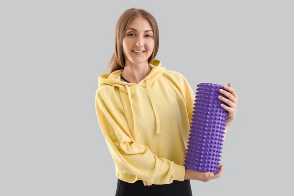 Young Woman Purple Foam Roller Light Background — Stock Photo, Image