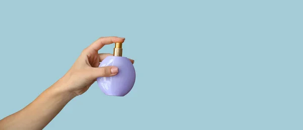 Female Hand Bottle Perfume Light Blue Background Space Text — 스톡 사진