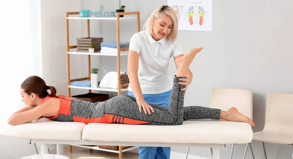 Physiotherapist Working Female Patient Medical Center — Stockfoto