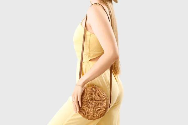 Elegant Woman Stylish Rattan Handbag Light Background Closeup — стоковое фото