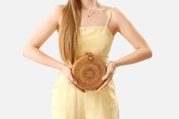 Woman Holding Stylish Rattan Handbag Light Background Closeup — Foto Stock