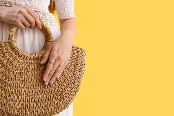 Elegant Woman Stylish Jewelry Holding Rattan Handbag Yellow Background — Photo