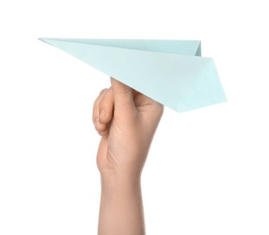 Woman with blue paper plane on white background