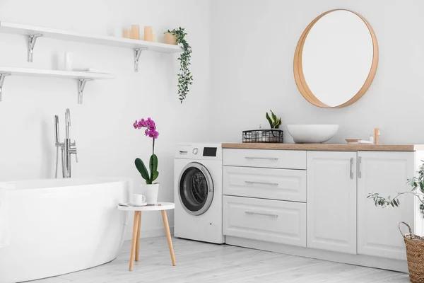 Stylish Bathroom Interior Washing Machine Orchid Flower Table White Wall — Stock Fotó
