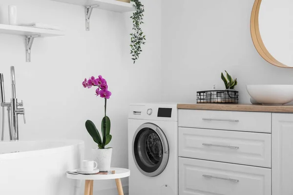 Stylish Bathroom Interior Washing Machine Orchid Flower Table White Wall — Stock Photo, Image