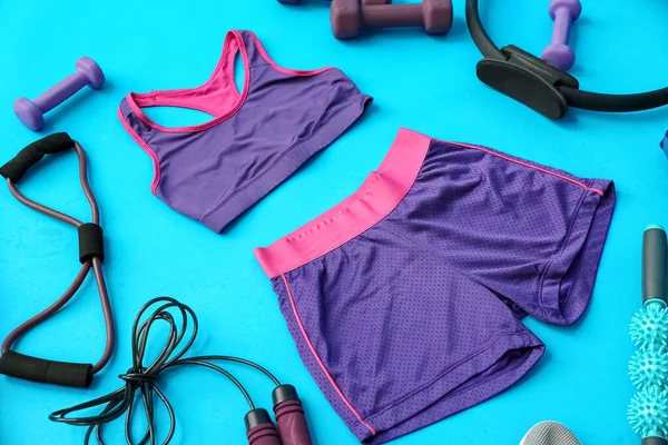 Female Sportswear Different Equipment Pilates Blue Background — Φωτογραφία Αρχείου