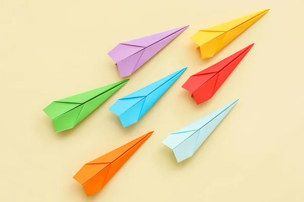 Colorful Paper Planes Beige Background — Φωτογραφία Αρχείου
