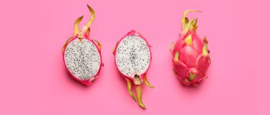 Pembe arka planda lezzetli ejderha meyvesi