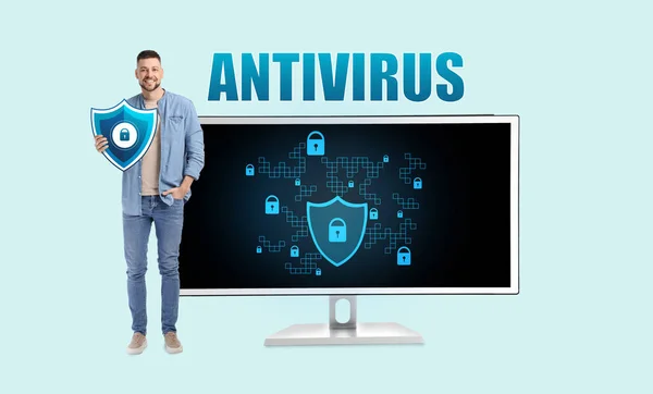 Man Icon Antivirus Big Computer Monitor Light Blue Background — ストック写真