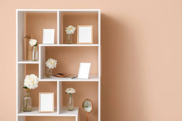 Shelf Unit Blank Photo Frames Beautiful Peony Flowers Beige Wall — 스톡 사진