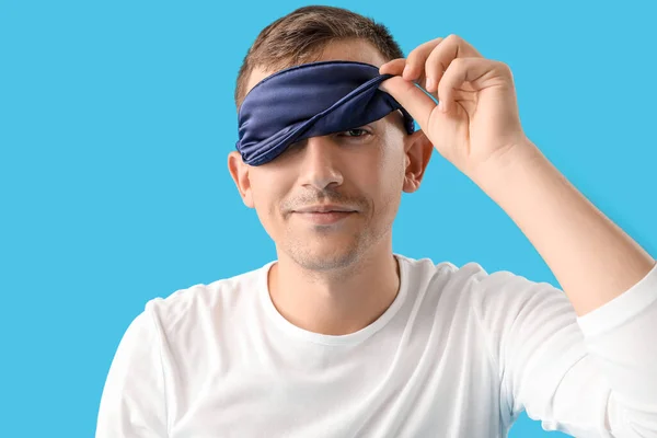 Young Man Sleeping Mask Blue Background — Fotografie, imagine de stoc