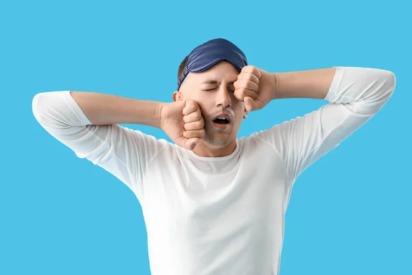 Young Man Sleeping Mask Yawning Blue Background — Stockfoto