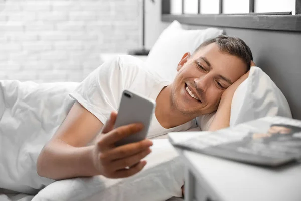 Young Man Using Mobile Phone Home Morning — Foto Stock