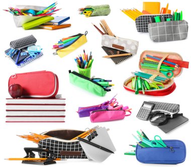 Set of pencil cases with school stationery on white background