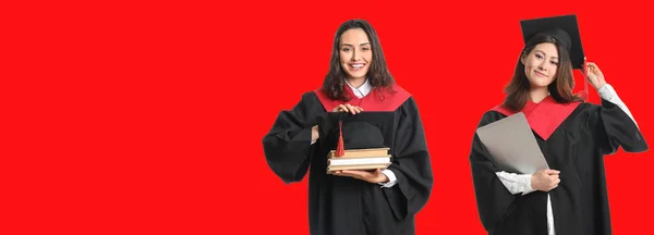 Female Graduating Students Red Background Space Text — Zdjęcie stockowe