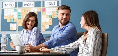Young business people working in office. Agile concept