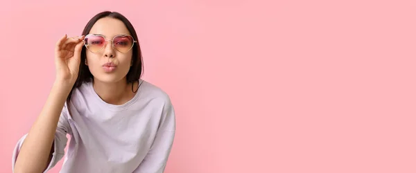 Young Woman Wearing Stylish Sunglasses Pink Background Space Text — kuvapankkivalokuva