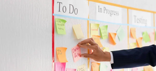 Businessman Attaching Sticky Note Scrum Task Board Office Closeup — Stock Photo, Image