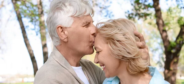 Mature Man Kissing His Happy Wife Park — Stok fotoğraf