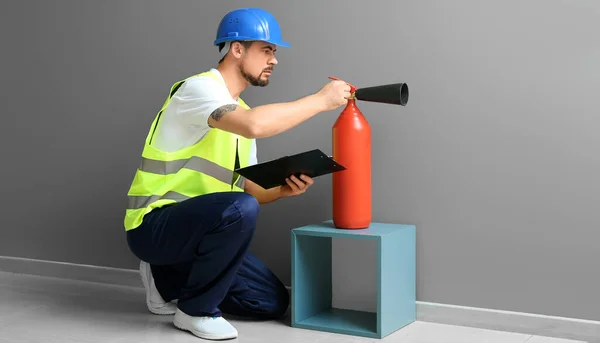 Fire Safety Specialist Inspecting Extinguisher Premises — 스톡 사진