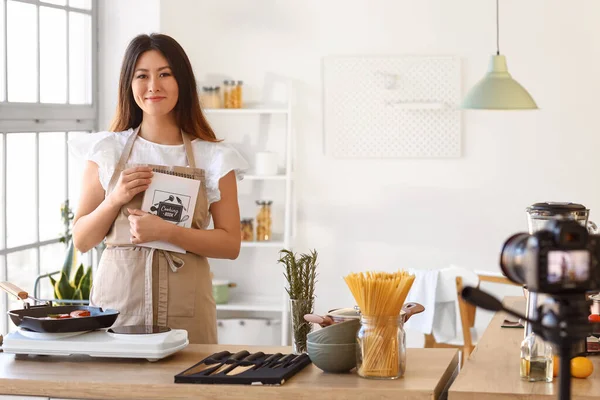 Young Asian Woman Cooking Book Recording Video Kitchen —  Fotos de Stock