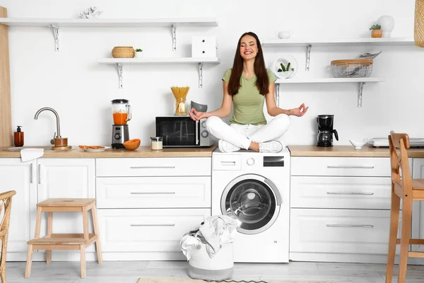 Young Woman Meditating Washing Machine Kitchen — Fotografia de Stock